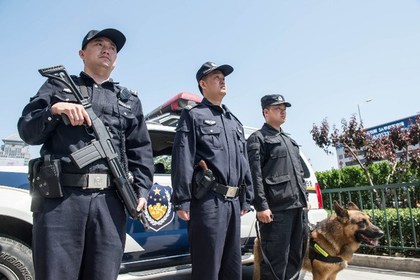 Xitoy politsiyachilari. Foto: AFP