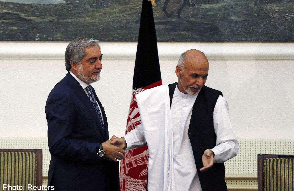 Afg‘oniston bosh vaziri Abdulla Abdulla va mamlakat prezidenti Muhammad Ashraf G‘ani