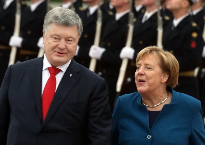 2018 йилда Украинанинг Киев шаҳрида ўша вақтдаги Украина президенти Пётр Порошенко билан учрашувда.