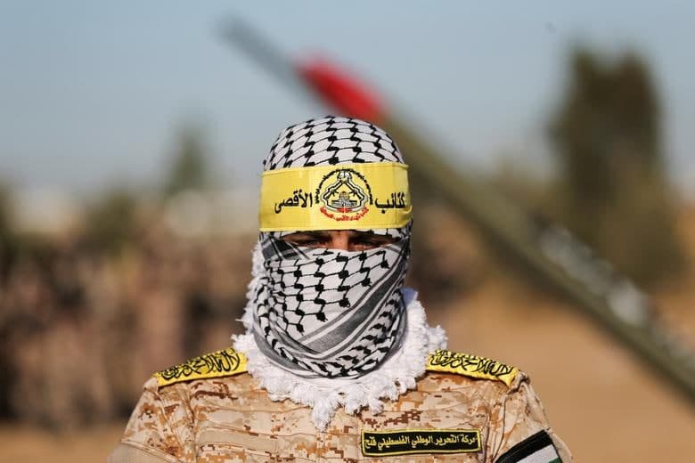 Falastinning Fatah harakati a’zolari G‘azo sektorining janubidagi Xon Yunus shahrida Isroilga qarshi miting o‘tkazmoqda.