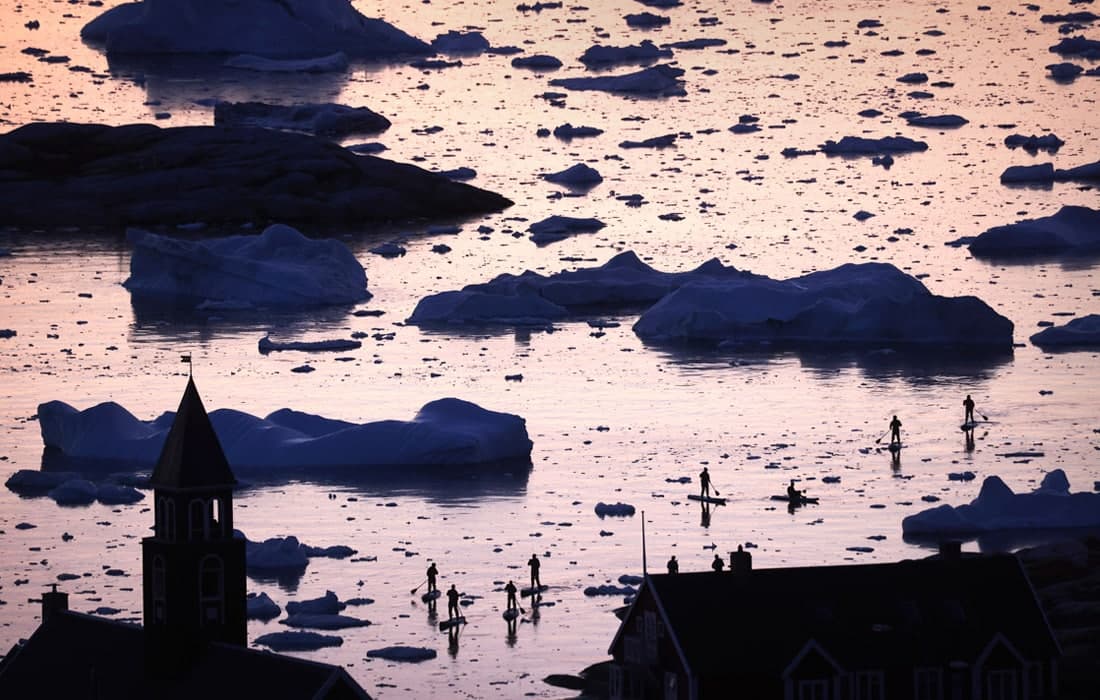 Grenlandiya g‘arbiy sohilining Disko ko‘rfazidagi muzliklar. Grenlandiyada bu yil rekord darajada muzliklar erishi kuzatildi.
