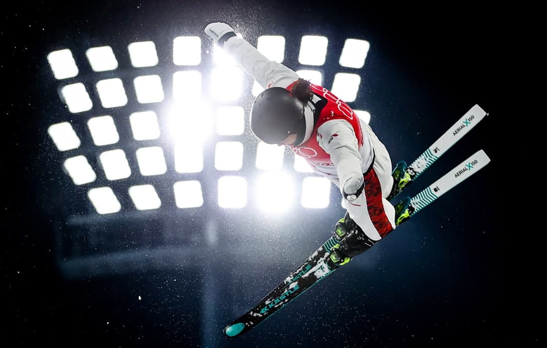 Pekin olimpiadasida chang‘i akrobatikasi bo‘yicha jamoaviy turnirda qatnashayotgan kanadalik Marion Teno.