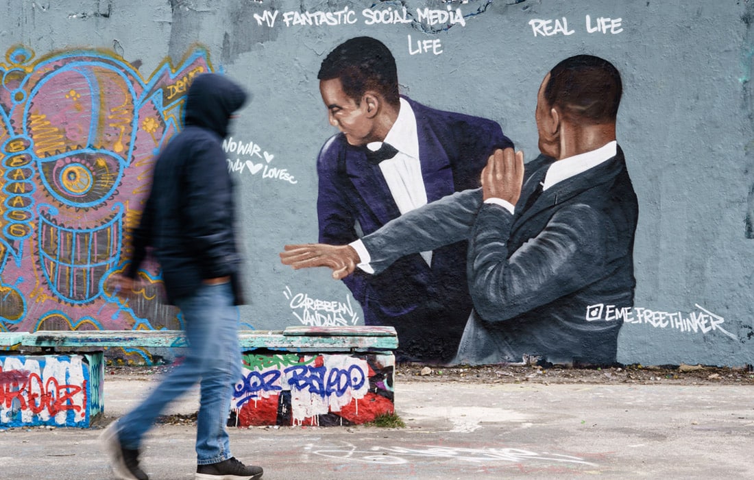 Берлинда Уилл Смитнинг «Оскар» маросимида Крис Рокни урган графити пайдо бўлди.