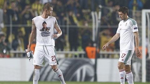 «Локомотив» Путин сурати туширилган футболка учун Тарасовни жазолайди