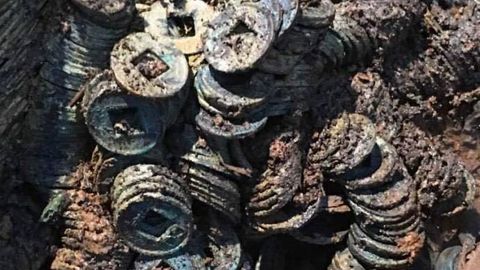 Xitoylik fermer o‘z yeridan salkam yarim tonna qadimiy tanga topdi