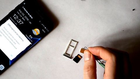 Иккита SIM-карта ва хотира картасини битта слотга жойлаш усули (видео)