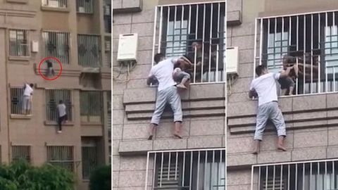 Xitoyliklar devorga tirmashib chiqib, panjaraga bo‘yni bilan osilib qolgan bolani qutqarib oldi