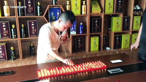 Хитойлик бир дақиқада 120 та шамни қулоғи билан ўчирди (видео)