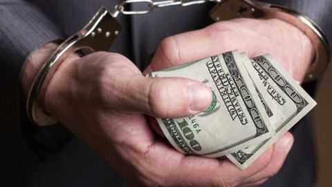 Фарғонада мактабгача таълим бўлими мудири минг доллар билан қўлга тушди