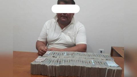 Сурхондарёда ҳокимлик захирасида бўлган ерни 70 млн сўмга сотмоқчи бўлган шахс ушланди