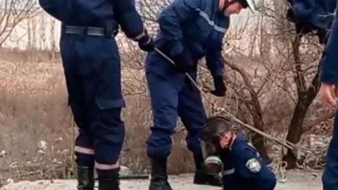 Employees of Ministry of Emergency Situations rescue dog in Fergana region