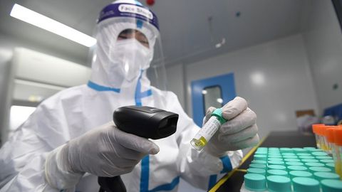 China says critical COVID cases have peaked as holiday travel surges