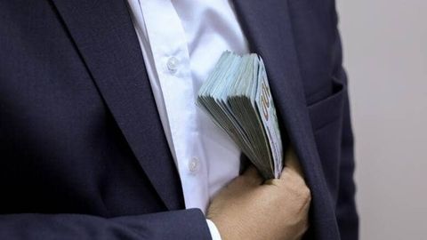Toshkent viloyatida MIB xodimi&nbsp;3 ming dollar pora olayotganida ushlandi
