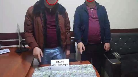 Andijonda advokat stajyori va sherigi 34 ming dollarni noqonuniy olayotganida qo&lsquo;lga tushdi (video)