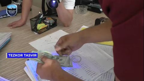 Toshkentda elektr tarmoqlar korxonasining ikki xodimi 10 ming dollar pora olayotganda ushlandi