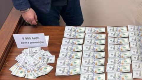 Тошкентда қалбаки 9900 долларни сотган икки киши ушланди