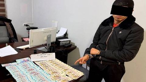 Наманганда 45 млн сўм миқдоридаги қалбаки купюрани сотаётган йигит ушланди