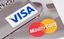 How can Russians apply for Visa cards in Uzbekistan?