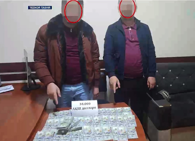 Andijonda advokat stajyori va sherigi 34 ming dollarni noqonuniy olayotganida qo‘lga tushdi (video)